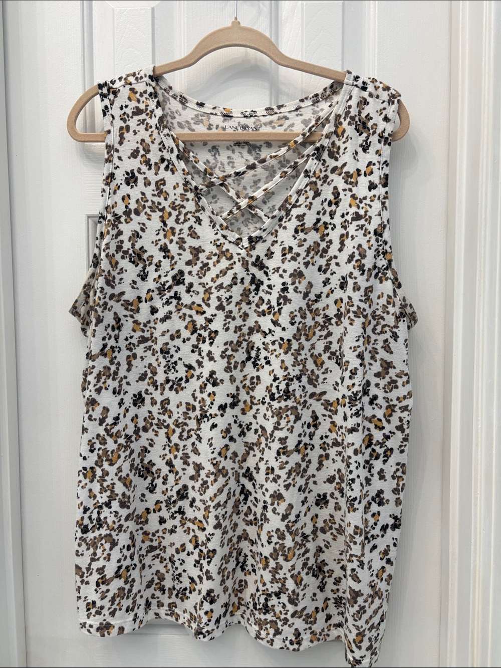 Sleeveless White Leopard Print V-Neck Tank with Crisscross Detail